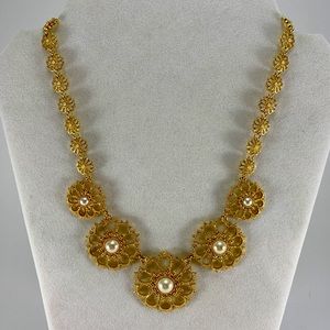 Gold and pearl flowers statement necklace